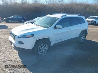 2015 Jeep Cherokee Latitude with VIN 1C4PJMCB3FW734573, listed as a IAAI auction lot 41825561 with 141,250 mi miles. Bid and sale history available at carsss.com. Image 18.