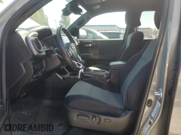 2022 Toyota Tacoma SR5 with VIN 3TMBZ5DN9NM033861, listed as a Copart auction lot 53704065 with 55,386 mi miles and Salvage title. Bid and sale history available at DreamBid. Image 7.