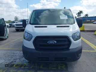 2020 Ford Transit Cargo with VIN 1FTYE1Y8XLKB80973, listed as a IAAI auction lot 41707281 with 112,721 mi miles and . Bid and sale history available at DreamBid. Image 12.