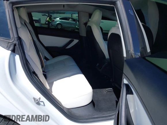 2019 Tesla Model 3 Mid Range with VIN 5YJ3E1EA5KF327181, listed as a IAAI auction lot 41860943 with 157,335 mi miles and . Bid and sale history available at DreamBid. Image 8.