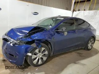 2021 Tesla Model Y Standard Range z VIN 5YJYGDED0MF107686, wystawiony jako Copart lot #86823154 z przebiegiem 96 136 mil mil oraz Tytuł czysty. Historia ofert i sprzedaży dostępna na DreamBid. Obrazek 1.