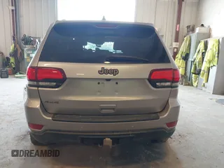 2016 Jeep Grand Cherokee Laredo with VIN 1C4RJFAG6GC366301, listed as a IAAI auction lot 42275011 with 203,133 mi miles and . Bid and sale history available at DreamBid. Image 16.