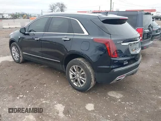 2021 Cadillac XT5 AWD Premium Luxury with VIN 1GYKNDRS6MZ147571, listed as a IAAI auction lot 41864286 with 46,144 mi miles. Bid and sale history available at carsss.com. Image 3.