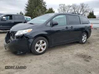 2015 Toyota Sienna LE AAS with VIN 5TDKK3DC5FS550597, listed as a Copart auction lot 51458215 with 74,090 mi miles and Salvage Title. Bid and sale history available at DreamBid. Image 1.