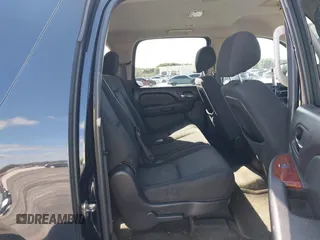 2011 Chevrolet Suburban LS with VIN 1GNSCHE04BR284777, listed as a IAAI auction lot 41291991 with 285,187 mi miles. Bid and sale history available at carsss.com. Image 8.
