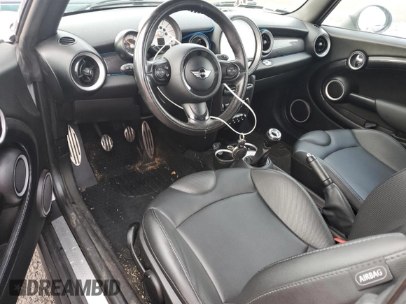 2013 MINI Convertible S with VIN WMWZP3C55DT297215, listed as a Copart auction lot 87995095 with Not provided miles and Salvage title. Bid and sale history available at DreamBid. Image 8.