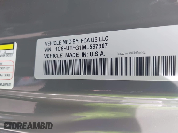 2021 Jeep Gladiator High Altitude with VIN 1C6HJTFG1ML597807, listed as a IAAI auction lot 42336812 with 46,450 mi miles and . Bid and sale history available at DreamBid. Image 9.