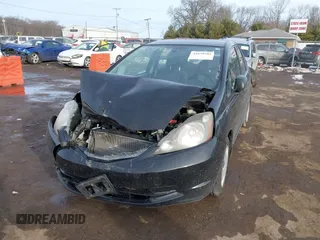 2010 Honda Fit with VIN JHMGE8H28AC014392, listed as a IAAI auction lot 41639302 with 147,433 mi miles. Bid and sale history available at carsss.com. Image 2.