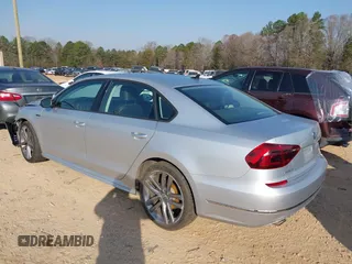 2018 Volkswagen Passat 2.0T S with VIN 1VWAA7A32JC035560, listed as a IAAI auction lot 41803286 with 125,969 mi miles. Bid and sale history available at carsss.com. Image 3.