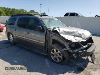 2005 GMC Envoy SLT z VIN 1GKET16M356134877, wystawiony jako Copart lot #57333345 z przebiegiem 205 714 mil mil oraz Szkoda całkowita • Salvage title. Historia ofert i sprzedaży dostępna na DreamBid. Obrazek 4.