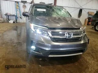 2019 Honda Pilot EX-L z VIN 5FNYF6H58KB100677, wystawiony jako Copart lot #61347595 z przebiegiem 59 987 mil mil oraz Szkoda całkowita • Salvage title. Historia ofert i sprzedaży dostępna na DreamBid. Obrazek 13.