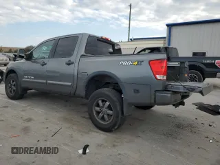 2015 Nissan Titan SV with VIN 1N6BA0ECXFN503651, listed as a Copart auction lot 88101695 with 120,649 mi miles and Salvage title. Bid and sale history available at DreamBid. Image 2.