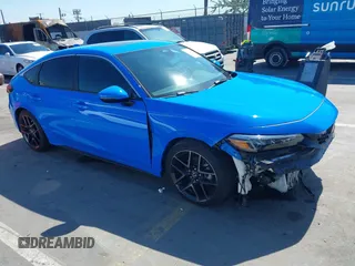 2024 Honda Civic Sport Touring z VIN 19XFL1G85RE026665, wystawiony jako IAAI lot #41735645 z przebiegiem 5025 mil mil oraz . Historia ofert i sprzedaży dostępna na DreamBid. Obrazek 1.