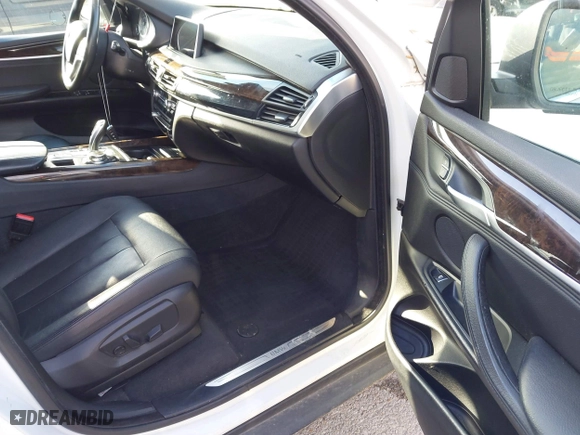 2016 BMW X5 xDrive35i with VIN 5UXKR0C52G0P29633, listed as a IAAI auction lot 41057391 with 176,697 mi miles. Bid and sale history available at carsss.com. Image 5.