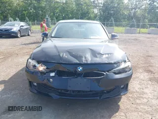 2013 BMW 3 Series 320i xDrive with VIN WBA3C3C50DF981864, listed as a IAAI auction lot 42599429 with 155,150 mi miles and . Bid and sale history available at DreamBid. Image 6.