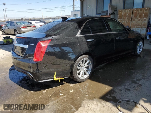 2019 Cadillac CTS Luxury RWD with VIN 1G6AR5SS7K0140817, listed as a Copart auction lot 49854315 with 96,480 mi miles and Salvage title. Bid and sale history available at DreamBid. Image 3.