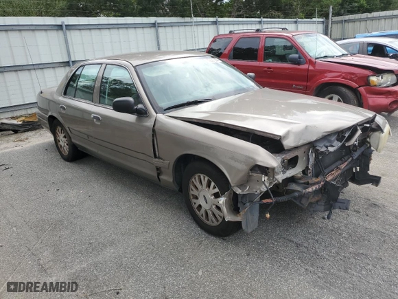 2005 Ford Crown Victoria LX with VIN 2FAFP74W95X126417, listed as a Copart auction lot 73537004 with 246,163 mi miles and Salvage Title. Bid and sale history available at carsss.com. Image 4.