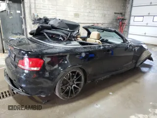 2013 BMW 1 Series 135i with VIN WBAUN7C5XDVM26903, listed as a Copart auction lot 60525595 with 219,810 mi miles and Salvage title. Bid and sale history available at DreamBid. Image 3.