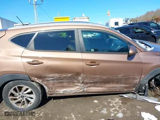 2016 Hyundai Tucson SE with VIN KM8J3CA4XGU063653, listed as a IAAI auction lot 41622270 with 103,270 mi miles. Bid and sale history available at carsss.com. Image 13.