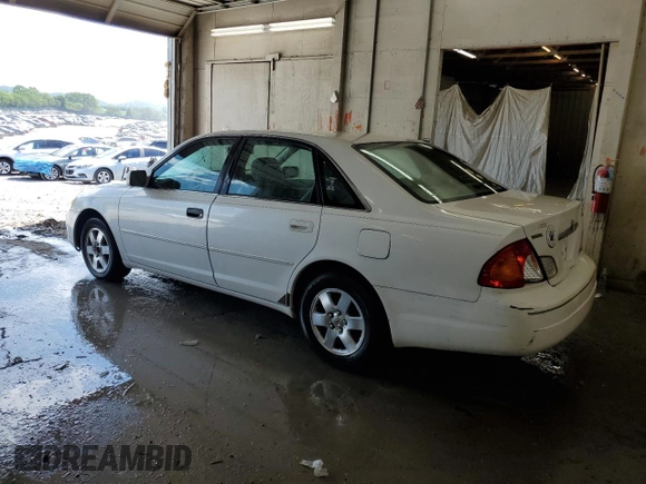 2000 Toyota Avalon XL with VIN 4T1BF28B9YU112742, listed as a Copart auction lot 54719355 with 213,896 mi miles and Salvage Title. Bid and sale history available at DreamBid. Image 2.