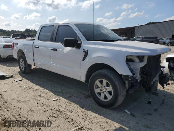 2021 Ford F-150 XL with VIN 1FTFW1E82MKD23506, listed as a Copart auction lot 71162334 with 71,387 mi miles and Salvage Title. Bid and sale history available at carsss.com. Image 4.