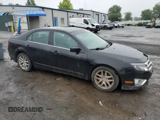 2012 Ford Fusion SEL with VIN 3FAHP0JA1CR348101, listed as a Copart auction lot 60995195 with 147,212 mi miles and Clean title. Bid and sale history available at DreamBid. Image 4.