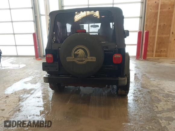 2006 Jeep Wrangler Sport with VIN 1J4FA49S96P733712, listed as a IAAI auction lot 41572913 with 93,511 mi miles. Bid and sale history available at carsss.com. Image 16.