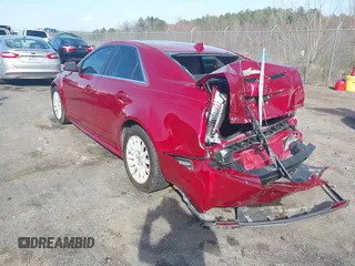 2012 Cadillac CTS Luxury with VIN 1G6DE5E54C0113154, listed as a IAAI auction lot 41467669 with 150,759 mi miles and . Bid and sale history available at DreamBid. Image 3.