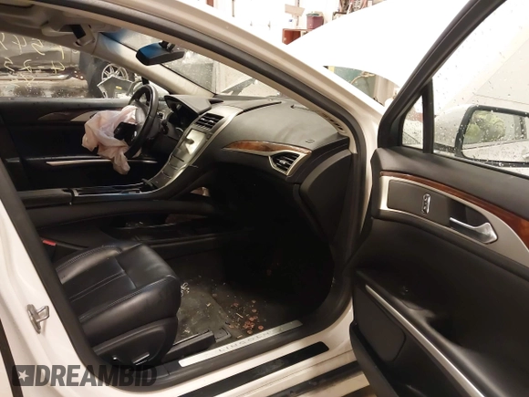 2016 Lincoln MKZ with VIN 3LN6L2JK0GR600486, listed as a IAAI auction lot 41943399 with 118,706 mi miles. Bid and sale history available at carsss.com. Image 5.