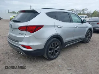 2018 Hyundai Santa Fe Ultimate z VIN 5XYZW4LAXJG536063, wystawiony jako IAAI lot #41795012 z przebiegiem 46 586 mil mil oraz . Historia ofert i sprzedaży dostępna na DreamBid. Obrazek 4.