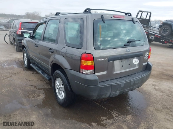 2005 Ford Escape XLS Value with VIN 1FMYU92Z35KA20497, listed as a IAAI auction lot 41509893 with 149,866 mi miles. Bid and sale history available at carsss.com. Image 3.