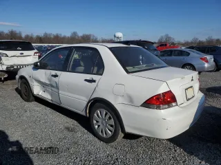 2006 Mitsubishi Lancer ES with VIN JA3AJ26EX6U046984, listed as a Copart auction lot 82014204 with 157,391 mi miles and Salvage Title. Bid and sale history available at carsss.com. Image 2.
