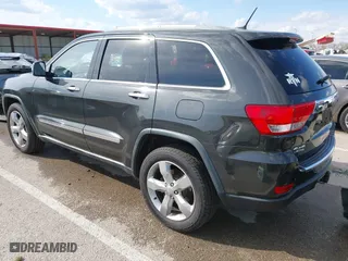 2011 Jeep Grand Cherokee Limited with VIN 1J4RR5GG4BC624876, listed as a IAAI auction lot 41877272 with 166,810 mi miles. Bid and sale history available at carsss.com. Image 3.