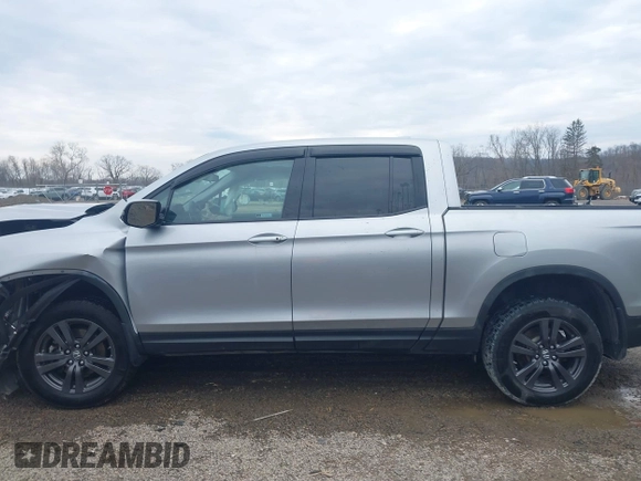 2020 Honda Ridgeline Sport with VIN 5FPYK3F13LB023123, listed as a IAAI auction lot 41694273 with 51,934 mi miles and . Bid and sale history available at DreamBid. Image 15.
