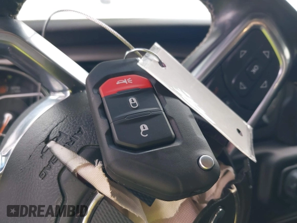 2019 Jeep Wrangler Unlimited Sahara with VIN 1C4HJXEN5KW542403, listed as a IAAI auction lot 42159197 with 60,378 mi miles and . Bid and sale history available at DreamBid. Image 11.