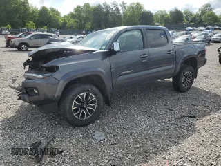 2021 Toyota Tacoma SR z VIN 3TMCZ5AN7MM391287, wystawiony jako Copart lot #57719325 z przebiegiem 118 087 mil mil oraz Szkoda całkowita • Salvage title. Historia ofert i sprzedaży dostępna na DreamBid. Obrazek 1.