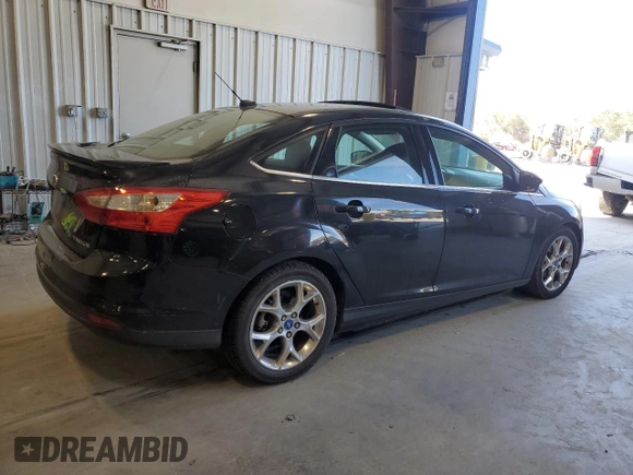 2013 Ford Focus Titanium with VIN 1FADP3J29DL193550, listed as a Copart auction lot 48848985 with 159,294 mi miles and Salvage Title. Bid and sale history available at carsss.com. Image 3.