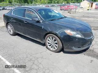 2015 Lincoln MKS с VIN 1LNHL9DK1FG605067, выставлен на аукционе IAAI как лот 42411967 с пробегом 296 805 миль миль и . История ставок и продаж доступна на DreamBid. Изображение 1.