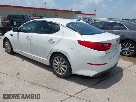 2015 Kia Optima LX with VIN KNAGM4A76F5620706, listed as a IAAI auction lot 42534268 with 191,405 mi miles and . Bid and sale history available at DreamBid. Image 3.