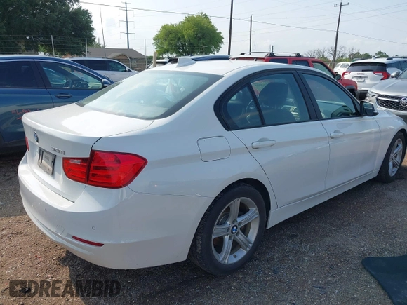 2015 BMW 3 Series 320i with VIN WBA3B1G5XFNT05903, listed as a IAAI auction lot 42063574 with Not Provided miles. Bid and sale history available at carsss.com. Image 4.