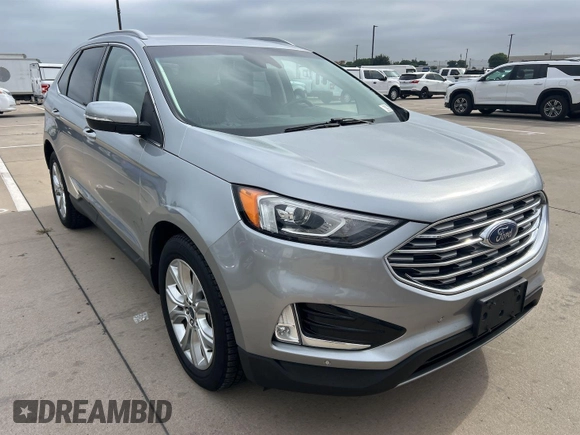 2020 Ford Edge Titanium z VIN 2FMPK3K95LBA30633, wystawiony jako IAAI lot #42473515 z przebiegiem 104 190 mil mil oraz . Historia ofert i sprzedaży dostępna na DreamBid. Obrazek 2.