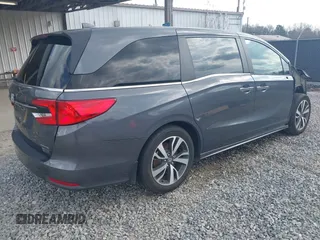 2023 Honda Odyssey Touring with VIN 5FNRL6H86PB065670, listed as a IAAI auction lot 41691093 with 22,518 mi miles and . Bid and sale history available at DreamBid. Image 4.