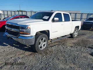 2017 Chevrolet Silverado 1500 LT with VIN 3GCUKREC8HG490827, listed as a IAAI auction lot 41810412 with 121,572 mi miles and . Bid and sale history available at DreamBid. Image 17.