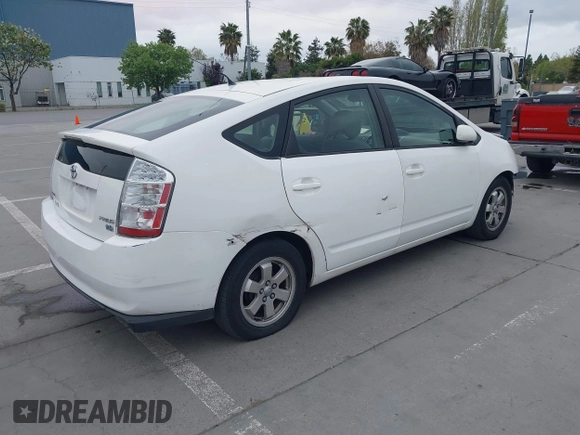 2004 Toyota Prius with VIN JTDKB22U640049837, listed as a IAAI auction lot 42033704 with 160,028 mi miles and . Bid and sale history available at DreamBid. Image 4.