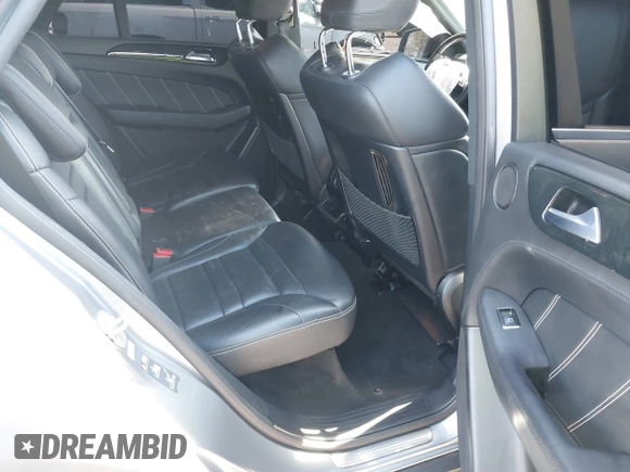 2013 Mercedes-Benz M ML 63 AMG with VIN 4JGDA7EB9DA155725, listed as a IAAI auction lot 41502675 with 64,849 mi miles. Bid and sale history available at carsss.com. Image 8.