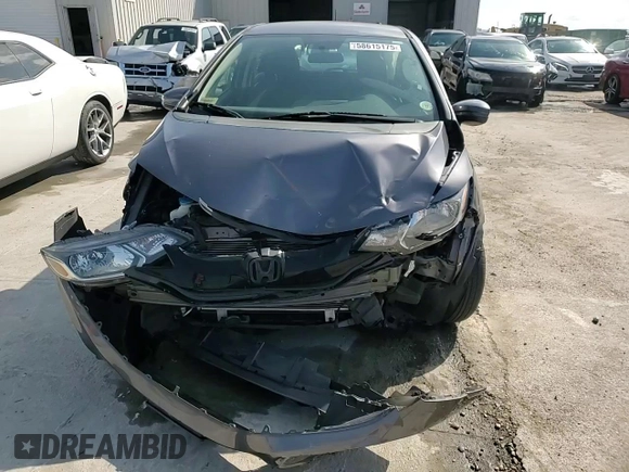 2015 Honda Fit LX с VIN 3HGGK5H59FM757797, выставлен на аукционе Copart как лот 58615175 с пробегом 109 608 миль миль и Списание • Salvage title. История ставок и продаж доступна на DreamBid. Изображение 13.
