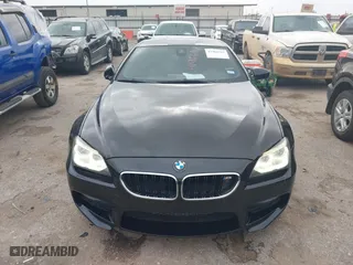 2013 BMW M6 with VIN WBSLX9C50DC968777, listed as a IAAI auction lot 41966918 with 113,458 mi miles. Bid and sale history available at carsss.com. Image 12.