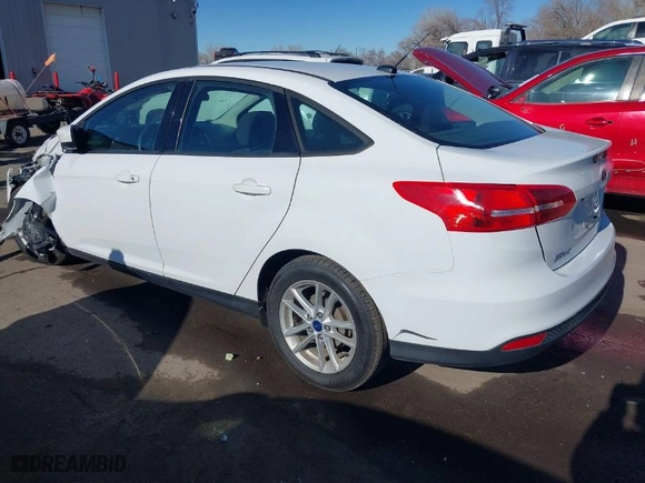 2018 Ford Focus SE with VIN 1FADP3F2XJL315773, listed as a IAAI auction lot 41298775 with 104,479 mi miles. Bid and sale history available at carsss.com. Image 3.