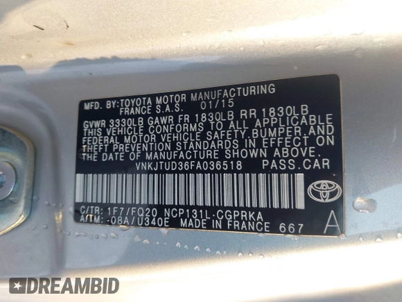 2015 Toyota Yaris L with VIN VNKJTUD36FA036518, listed as a IAAI auction lot 41233406 with 138,481 mi miles. Bid and sale history available at carsss.com. Image 9.
