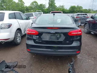 2017 Ford Focus SE z VIN 1FADP3F25HL253466, wystawiony jako IAAI lot #42303404 z przebiegiem 89 779 mil mil oraz . Historia ofert i sprzedaży dostępna na DreamBid. Obrazek 17.